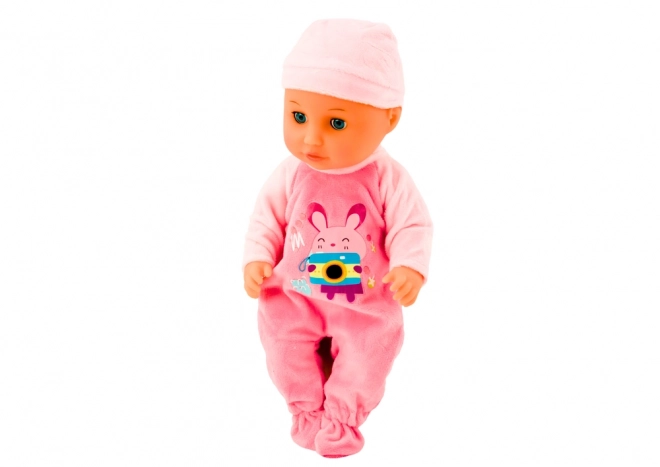 Baby pop met roze kleding en geluidseffecten