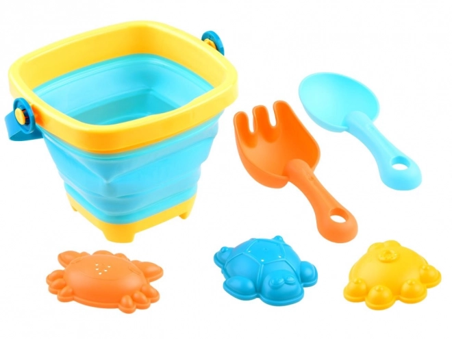 Set speelgoed voor zand met emmer en vormpjes