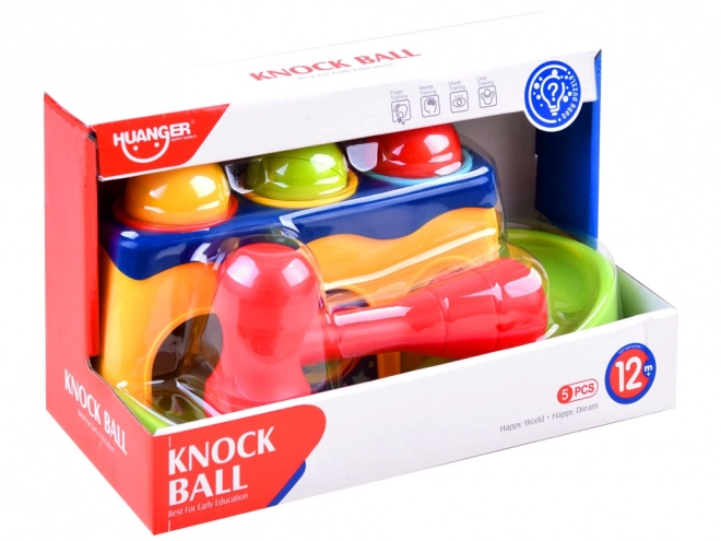Kleurige hamer met ballen voor kinderen