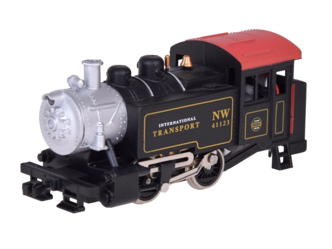 Elektrische treinstellen met klassieke stoomlocomotief en bedieningsunit