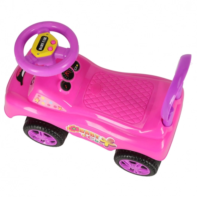 Roze loopautootje met claxon