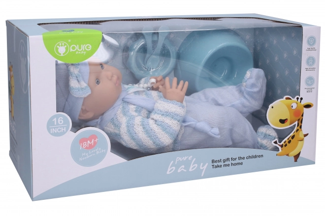 Baby in blauwe overall 40 cm