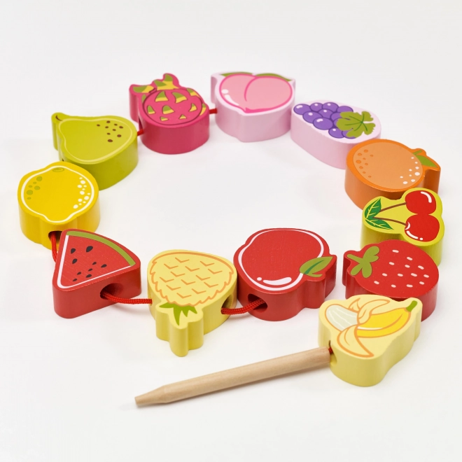 Houten rijgblokken met fruit