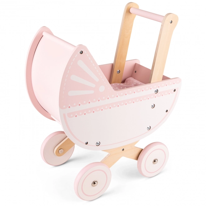 Roze houten poppenwagen met dekentje