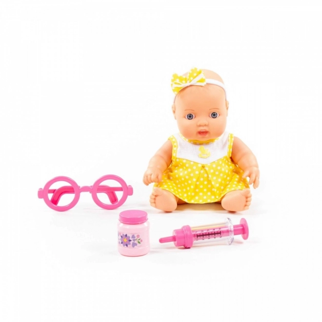 Zieke baby met accessoires