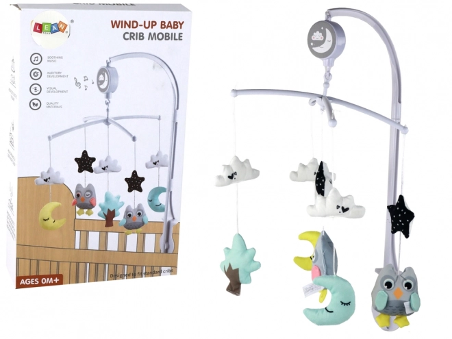 Babymobiel boven bedje met muziekdoos wit