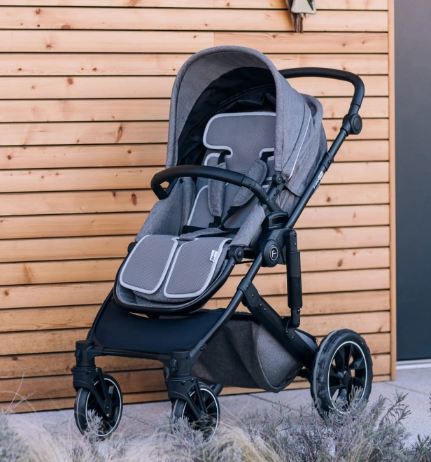 Universele grijze inleg voor autostoel en kinderwagen