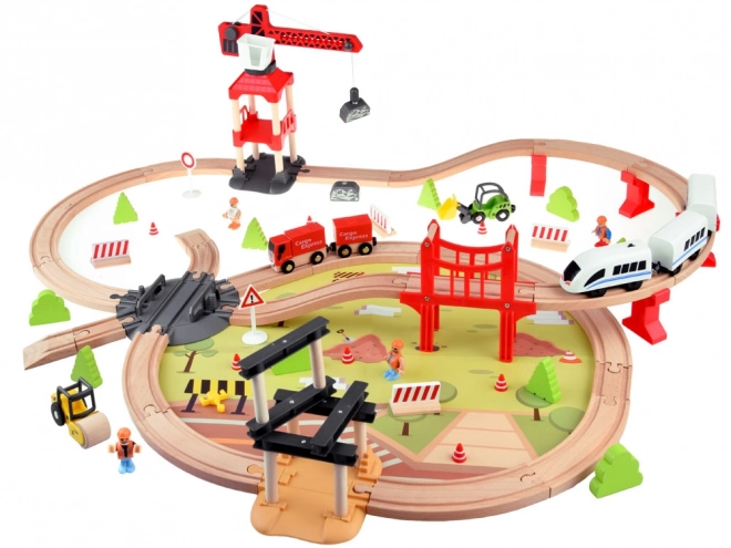 Houten spoorbaan voor kinderen met transportbasis en kraan
