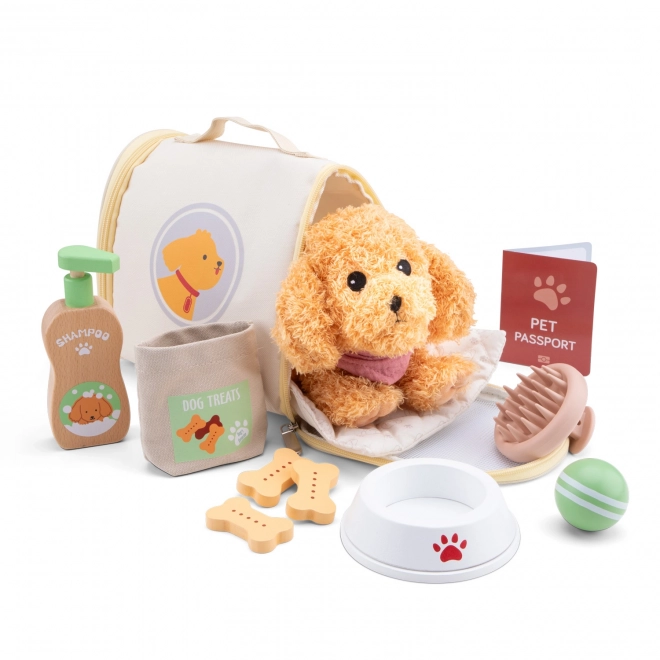 Kinderset voor de verzorging van een pluchen hondje
