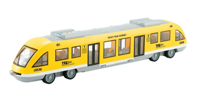 Tram op traagheidsmotor geel 1:16