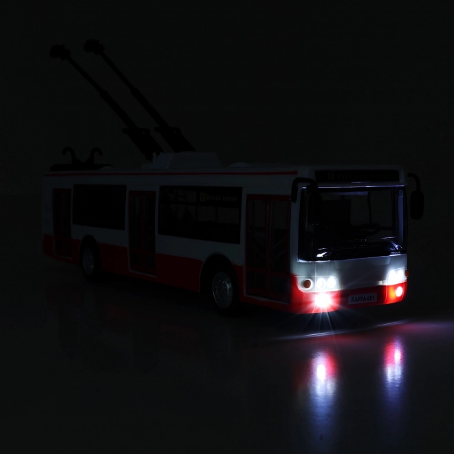 Trolleybus Tsjechisch sprekend plastic 29cm rood vrij rijden op bat. met licht en geluid in doos 33x11x10cm
