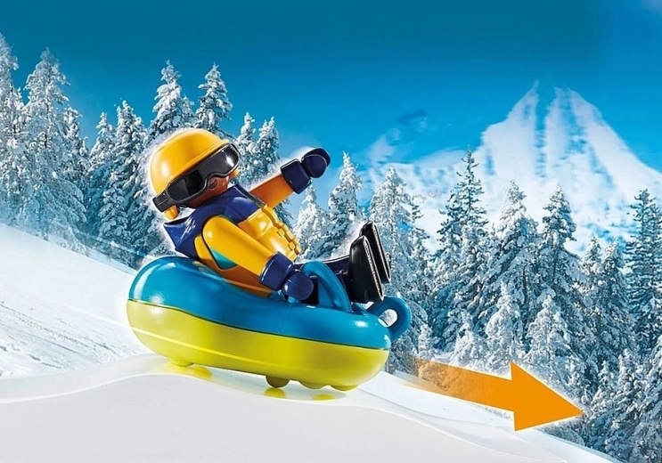 Snelle afdalingen met snowtube en slee
