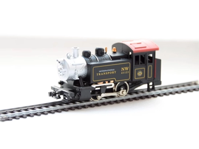 Elektrische treinstellen met klassieke stoomlocomotief en bedieningsunit