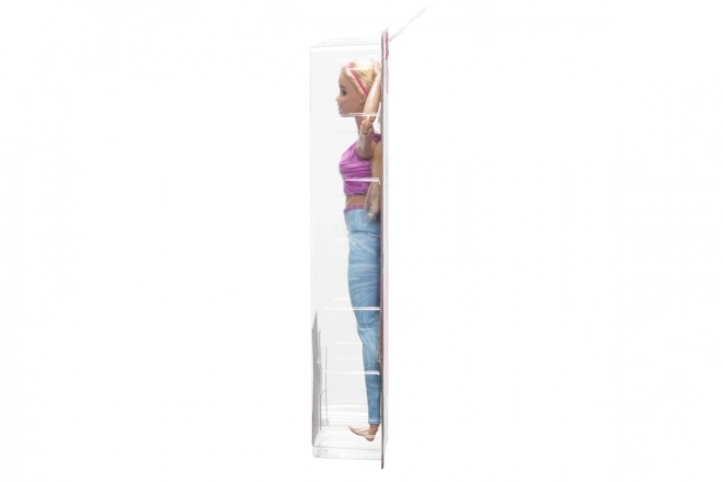 Barbie in beweging - Blondine met blauwe legging HRH27