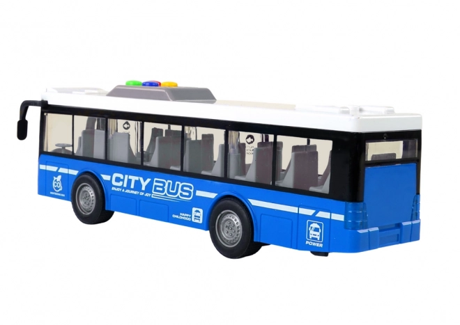 Interactieve blauwe batterijbus met verlichting en geluiden 1:16