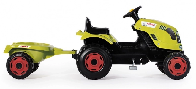 Tractor op trappers CLAAS Arion 400 met aanhangwagen groen