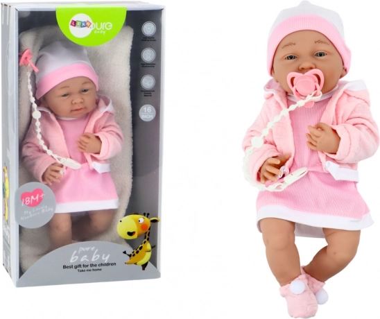 Babypop met accessoires in het roze