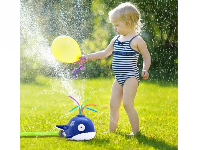 Vrolijke walvis water sproeier