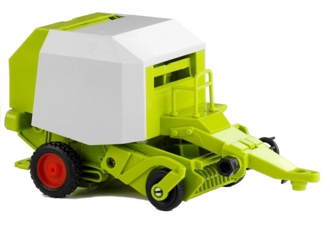 Tractor met balenpers