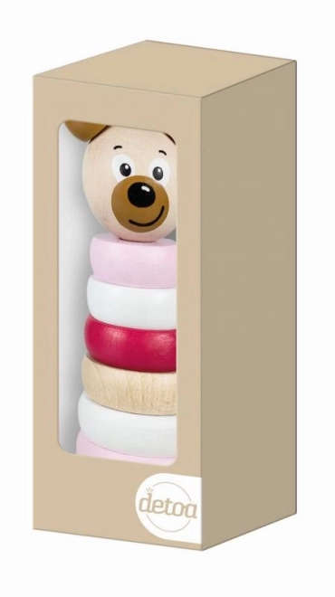 Roze houten piramide met berenhoofd