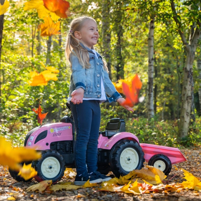 Tractor trapauto County Star met roze aanhangwagen