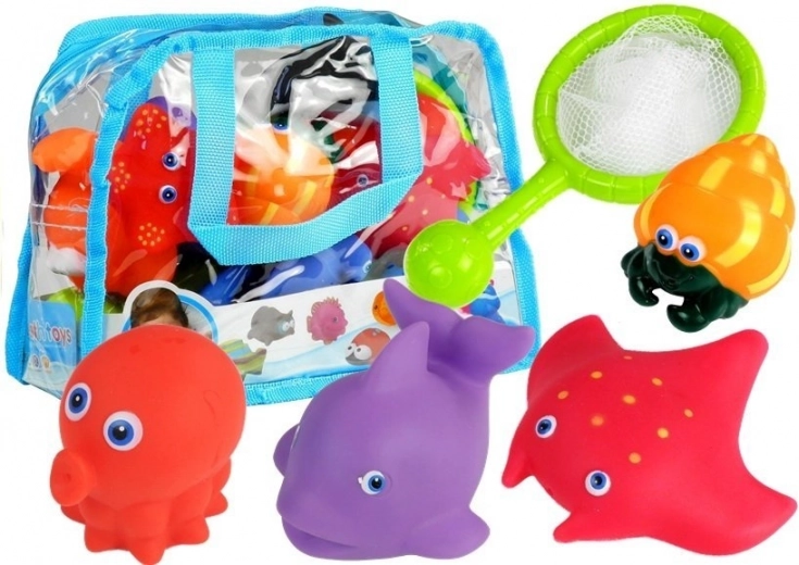 Set badspeeltjes met zeedieren en schepnet