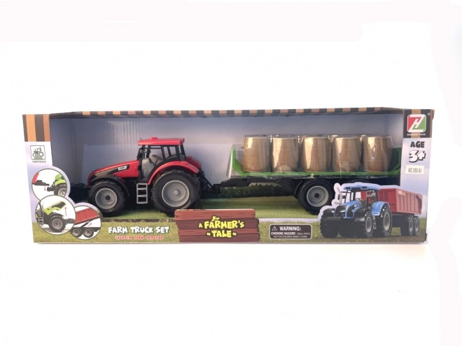 Tractor met vliegwiel en aanhanger vol hooi