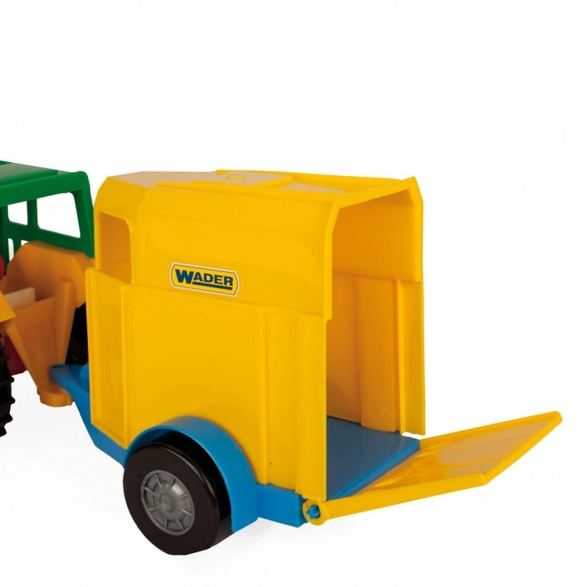 Tractor met aanhanger voor paarden