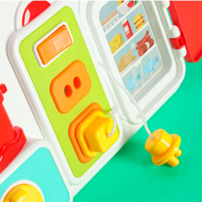 Montessori manipulatiebord met keukenelementen en leermatige klok