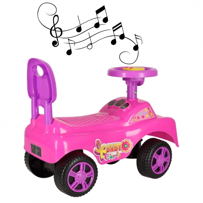 Roze loopautootje met claxon
