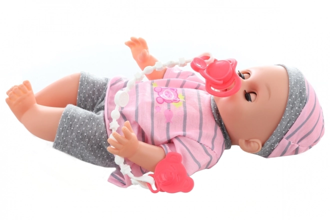 Baby plaspop 28 cm met geluiden en accessoires