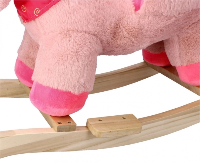 Roze eenhoorn met autostoel