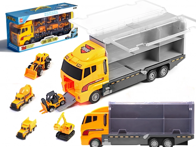 Vrachtwagen met bouwvoertuigen