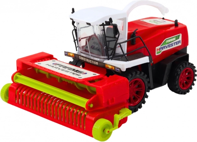 Rode landbouwmachine met aandrijving