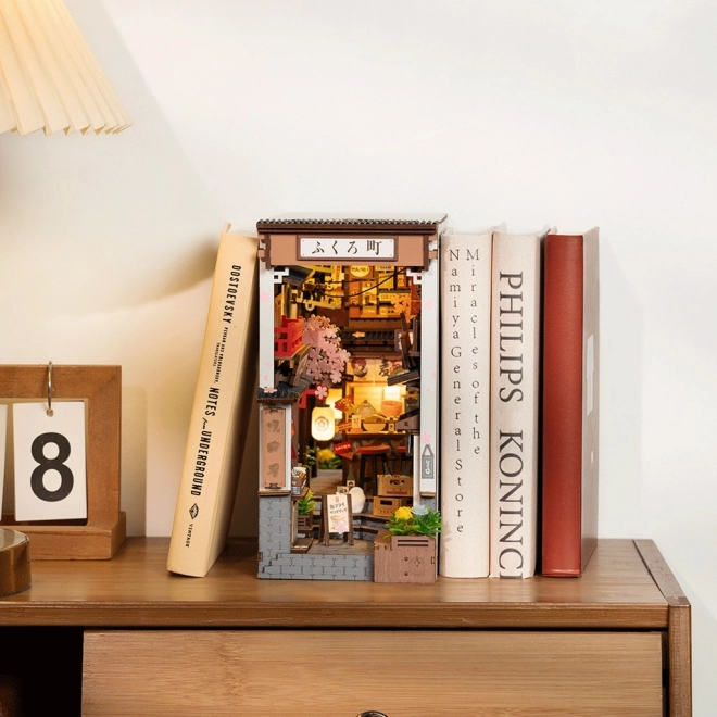3D puzzel boekensteun Sakuralaan met wijn