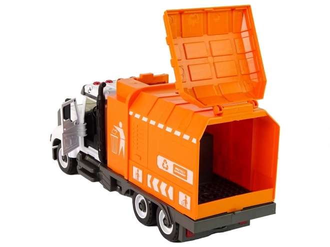 Oranje afvalwagen met schroef- en draaibare accessoirekit