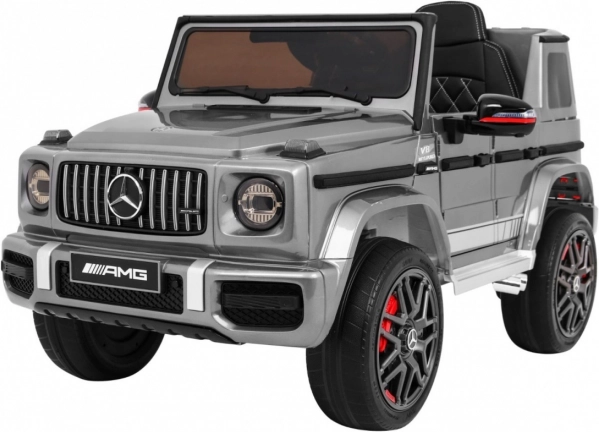 Elektrische kinderauto Mercedes-AMG G63 met zilverkleurige lak, afstandsbediening en mp3