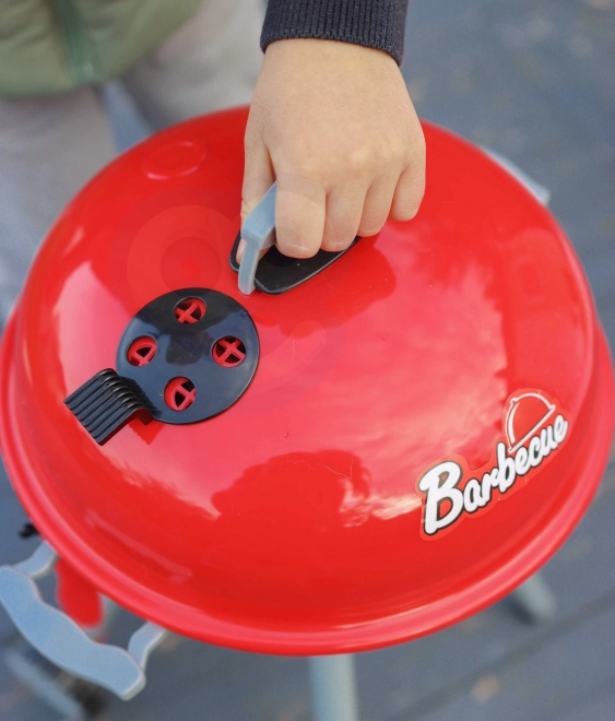 Kindergrill met lichten en geluiden op batterijen