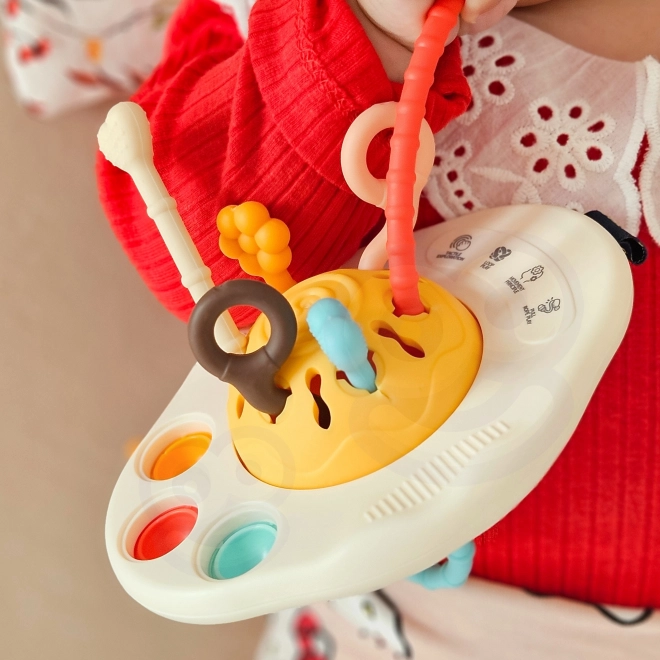 Woopie sensorisch speelgoed Montessori bijtspeeltje rammelaar UFO