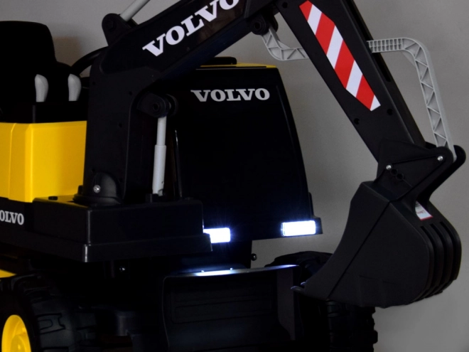 Kinderaccu-graver Volvo met beweegbare schep – Geel