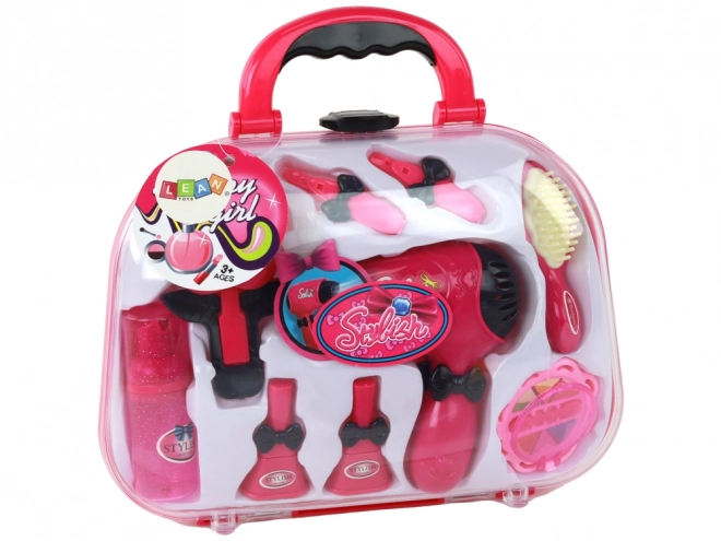 Stijlvol roze kinderkoffertje met cosmetica-accessoires