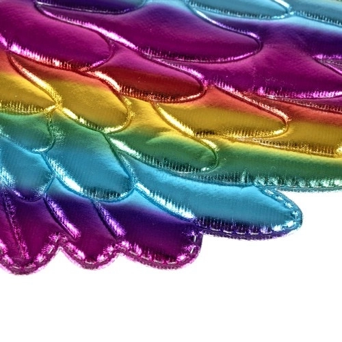 Eenhoorn kostuum met een regenboogrok en vleugels