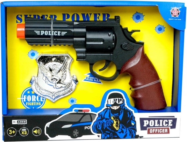 Politiepistool met badge PLEJO