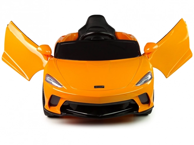 Kinderen batterijauto McLaren GT oranje