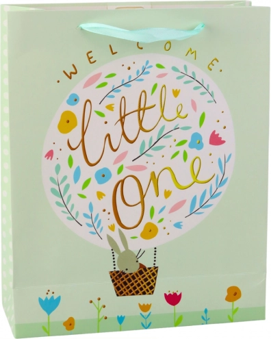 Groene cadeautas met konijntje voor het verwelkomen van een baby