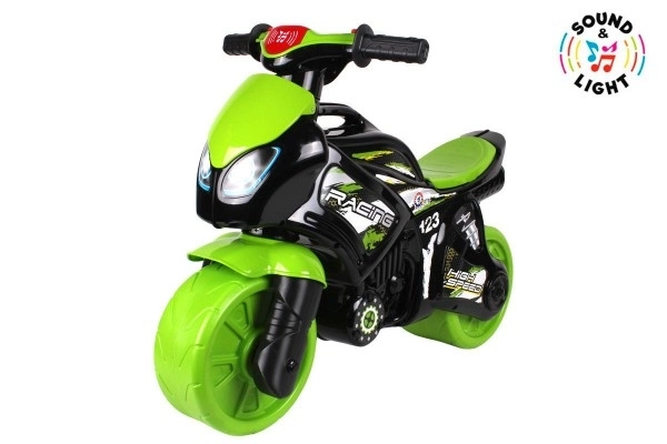 Loopfiets motor groen-zwart plastic op batterij met licht en geluid in zak 36x53x74cm
