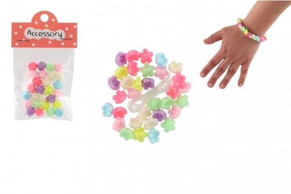 Plastic kralen bloemetjes met koord 2 soorten in zakje 6,5x11x1cm