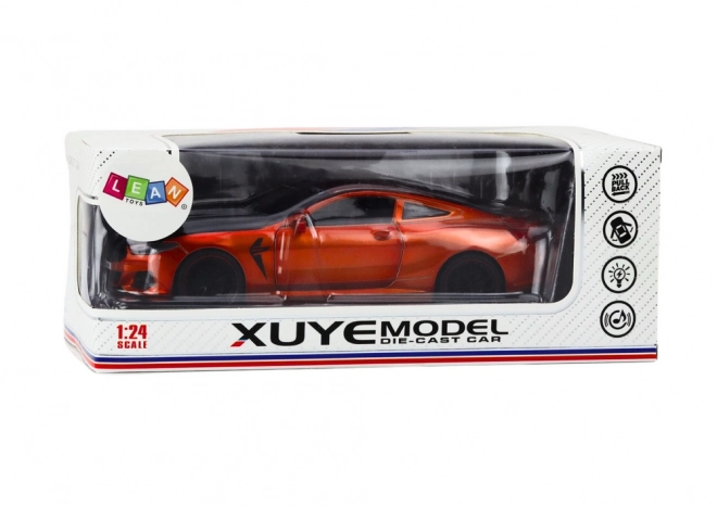 Metalen sportmodel met wrijvingsaandrijving en opengaande elementen 1:24 oranje