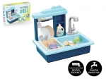 Blauwe kinderafwasbak met batterijgevoede kraan