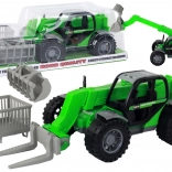 Groene tractor met uitschuifbare arm en verwisselbare opzetstukken